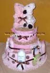 pink and white chocolate polka dot diaper cake