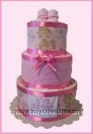 precious moments diaper cake with pink satin ribbon