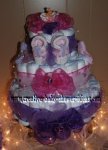 purple and pink princess butterfly diaper cake