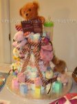 pink and brown polka dot bear diaper cake