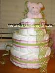 green and pink polka dot pig diaper cake