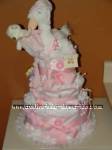 pink and white stork diaper cake