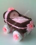 pink and brown baby carriage diaper cake