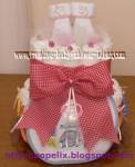 red and white plaid diaper cake with booties on top