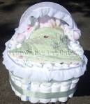 green and white diaper bassinet cake