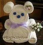 white teddy bear created out of rolling towels