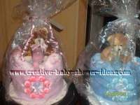 pink and blue diaper cakes for a baby shower