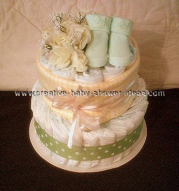 green polka dot bootie diaper cake