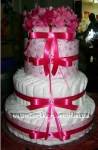 bright pink bow diaper cake with rhinestone accents