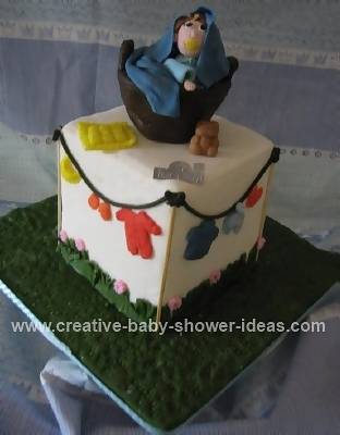 clothesline baby basket cake