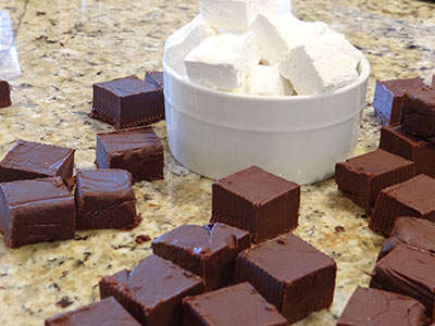 marshmallows and hot chocolate squares ready to be stacked