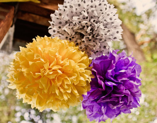 purple and yellow tissue pom poms