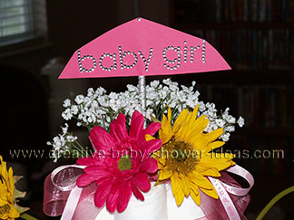 top of princess diaper cake pink umbrella with baby girl rhinestones