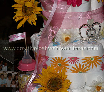 princess diaper cake with baby bottle towers