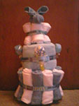 grey and white boo boo bunny towel cake