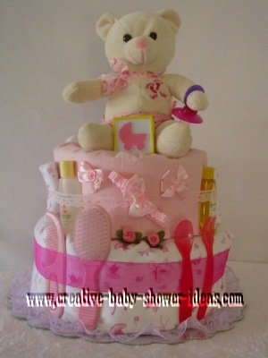 pink baby carriage bear diaper cake