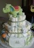 green elephant diaper cake with baby bib tied to front