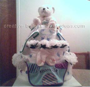 white bear diaper cake with white flowers