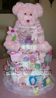 pink teddy bear and flower diaper cake