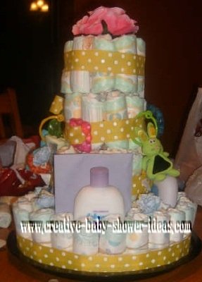 pink flowers and polka dot ribbon diaper cake