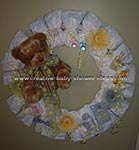 green and yellow diaper wreath with brown bear