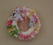 pink and white kitty cat diaper wreath