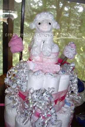 closeup of girl lamb diaper cake