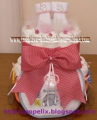 girl diaper cake with booties and red plaid bow