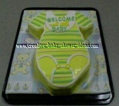 yellow and green onesie baby shower cake