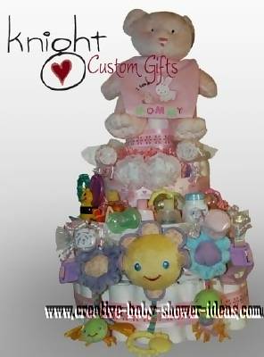 pink and cream teddy bear diaper cake