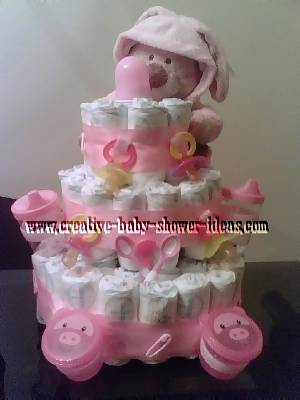 pink teddy bear and pacifiers diaper cake