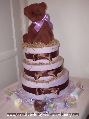 purple and brown teddy bear diaper cake