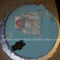 blue sleeping baby blanket cake