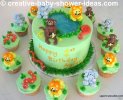 cute light green jungle baby shower cake and cupcakes with fondant jungle animals