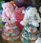 blue and pink twin diaper cakes