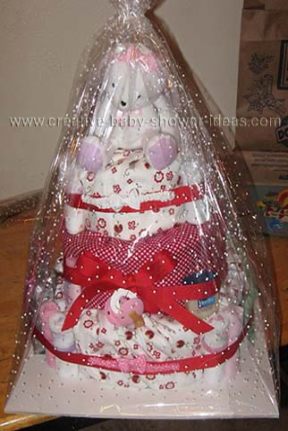 finised and wrapped red and white ladybug bunny diaper cake