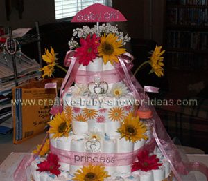 pink and yellow princess castle diaper cake