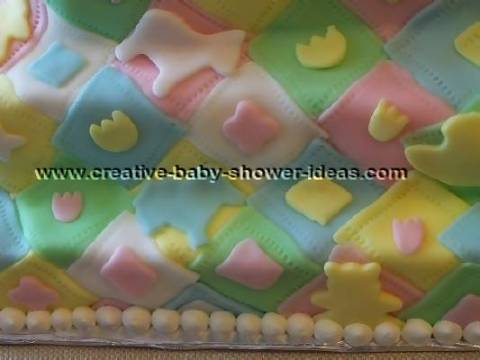 closeup of colorful quilt blocks baby cake