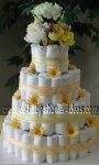 yellow and white daisy diaper cake