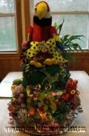 rainforest parrot and greenery nappy cake