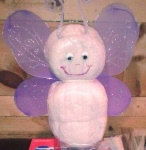 purple and white diaper butterfly