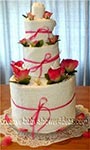 pink and white towel cake