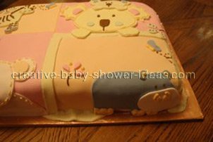 closeup of hippo animal on quilt blocks cake