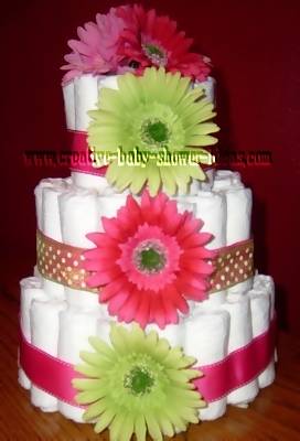 green and pink baby diaper cakes