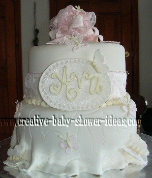 white fondant butterfly cake with flowers