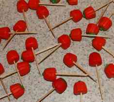 toothpicks pushed into pumpkin mellowcreme candy