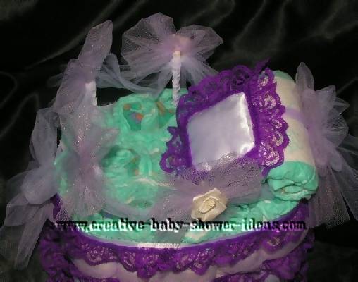 top of bassinet diaper cake showing pillow