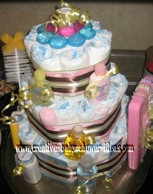 top view of mod diaper cake with baby supplies