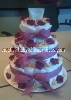 purple and cream flowers diaper cake