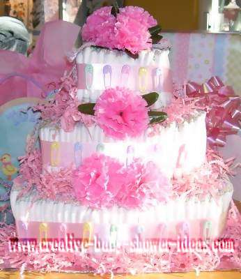 elegant pink carnations and baby pins diaper cake